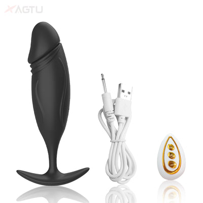 Black silicone butt plug with charging cable and remote control on white background