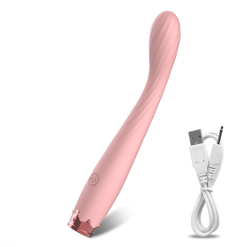 Pink wand vibrator with DC charging on white background